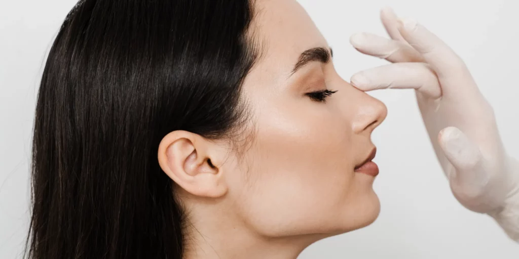 woman getting a nose exam
